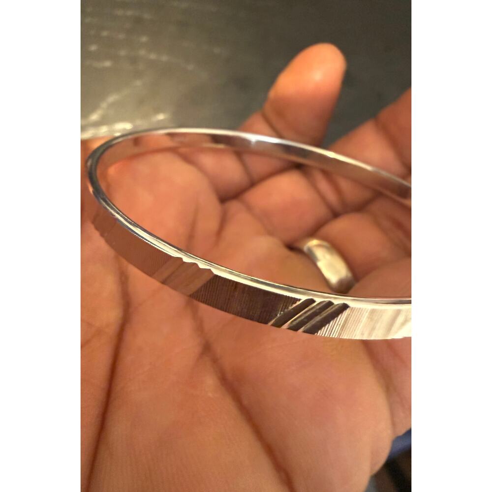 Vintage Signed Monet Silver Tone Etched Bangle Bracelet